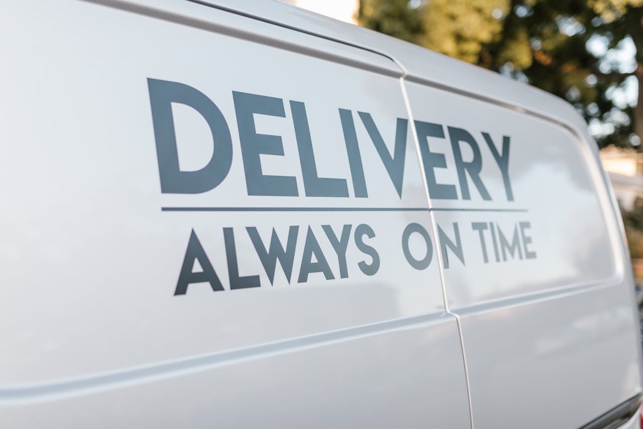 why-choose-us Close-up of delivery van with slogan 'Always On Time' emphasizing timely service.